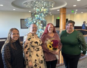 Doris Burr celebrates with her team