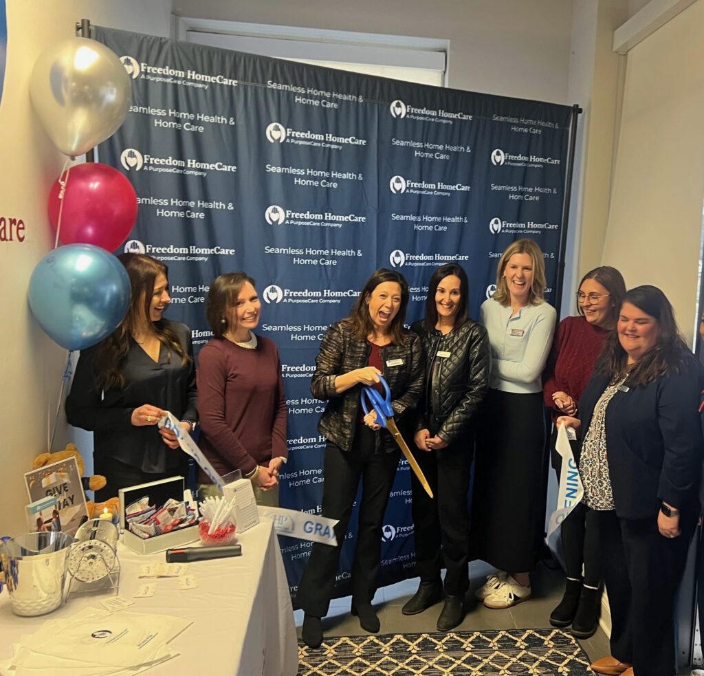 The Freedom Home Care team celebrates expanding home care in Northern Illinois with a ribbon cutting ceremony